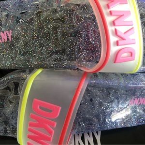 Brand new, Never worn. DKNY “Jill Jelly” slip-on Size 5